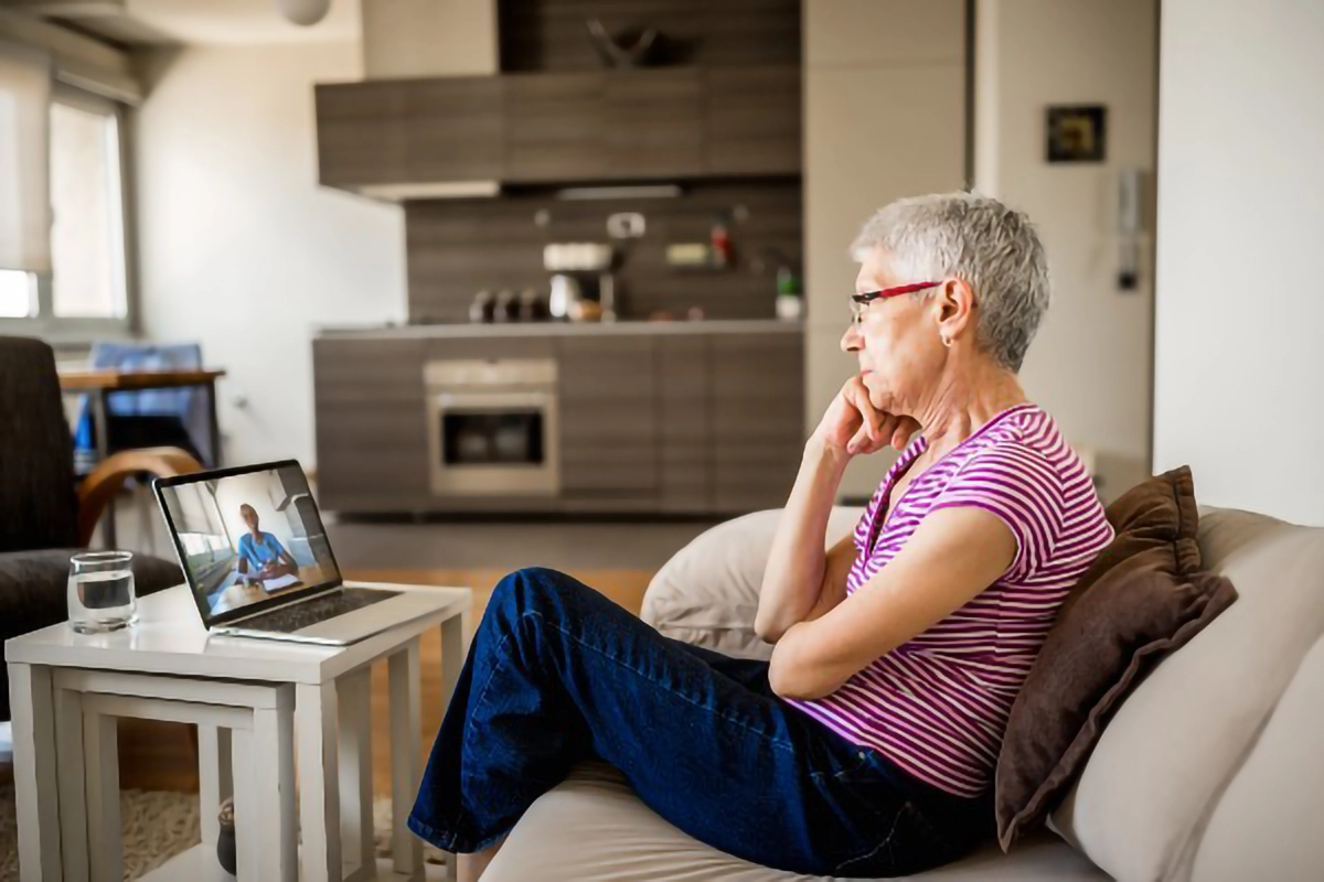 Person attending a webinar from their own home